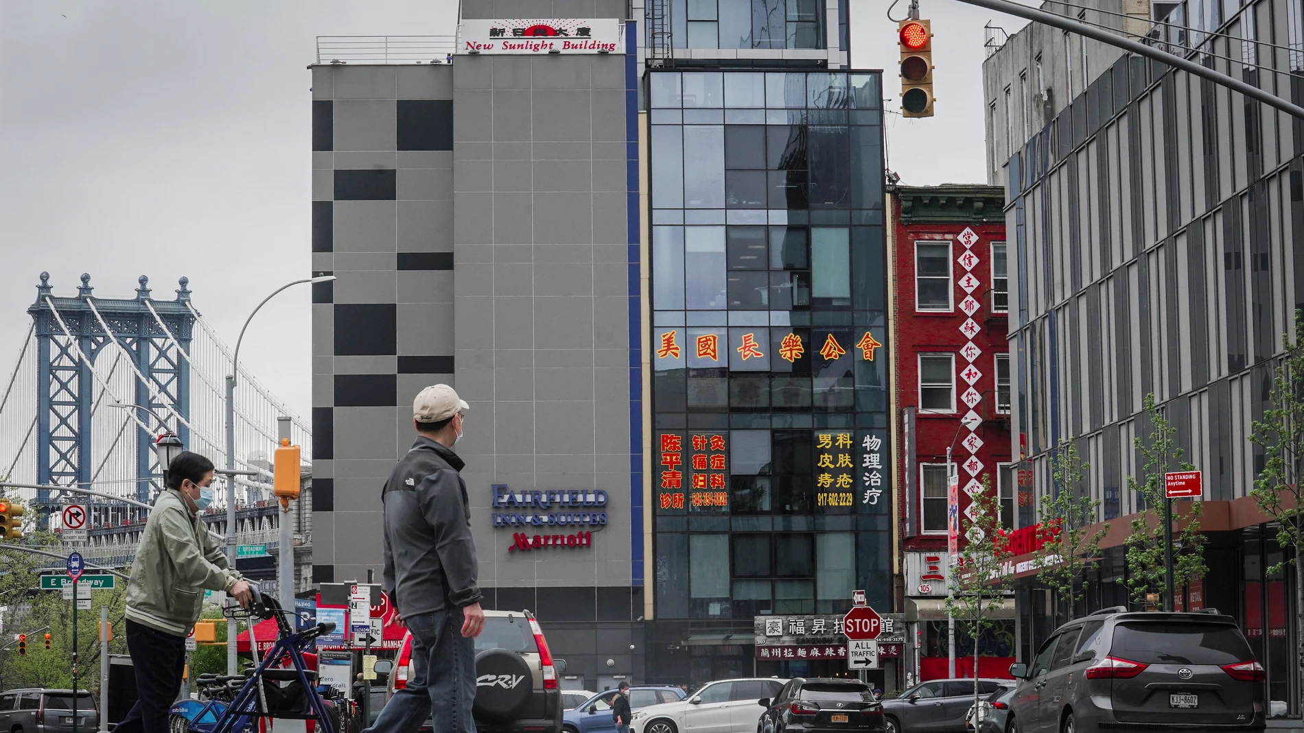 FILE - A six story glass facade building, center, alleged to be the site of a foreign police outpost for China in New York's Chinatown, Monday, April 17, 2023. (AP Photo/Bebeto Matthews, File)