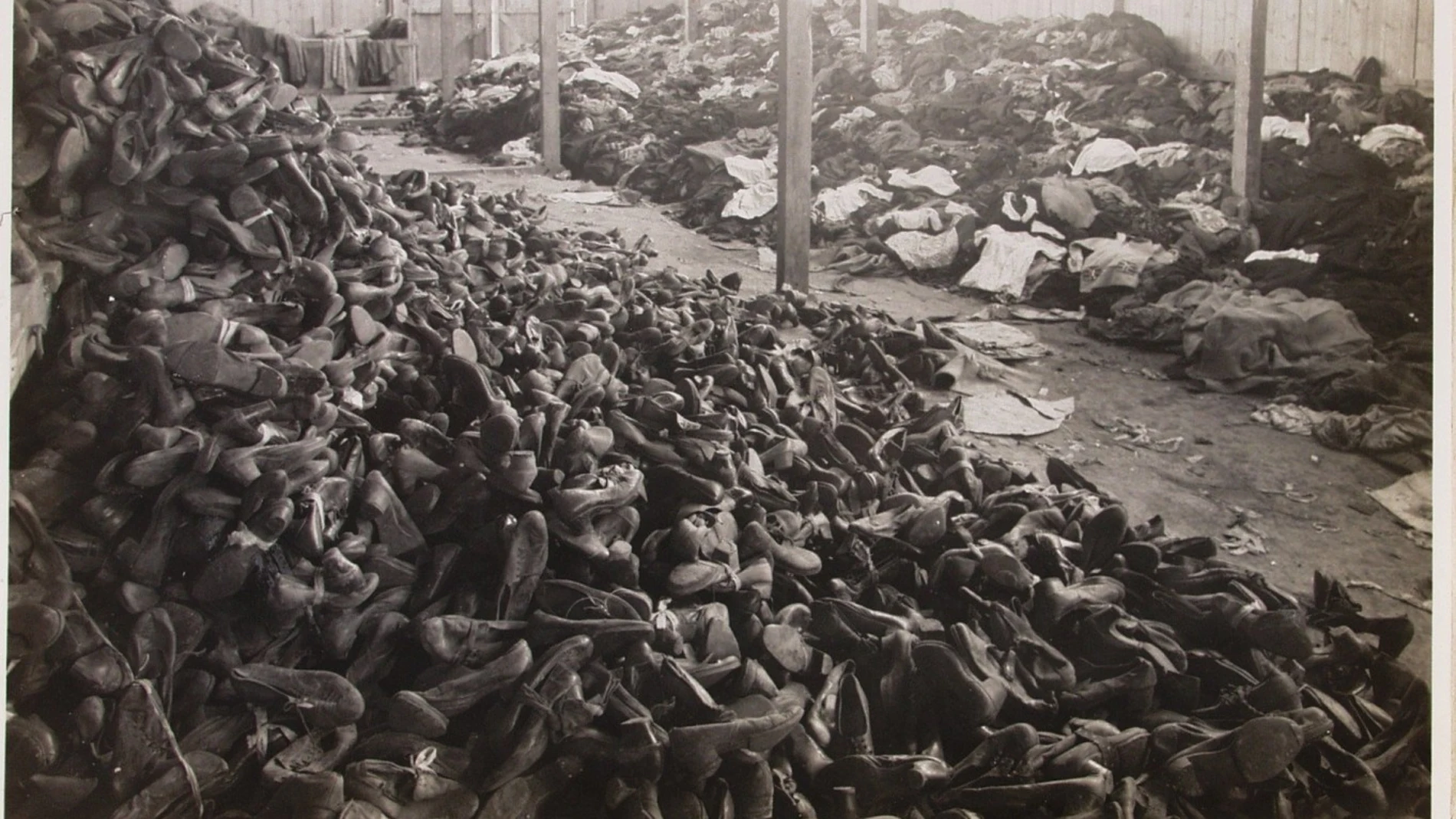 A handout photo made available by the Auschwitz Memorial and Museum shows piles of shoes and clothes that belonged to people brought to Auschwitz for extermination at the former German Nazi concentration and extermination camp KL Auschwitz-Birkenau in Oswiecim, Poland, 1945