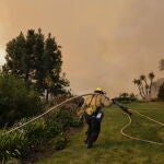 Wildfires continue to rage through Los Angeles area