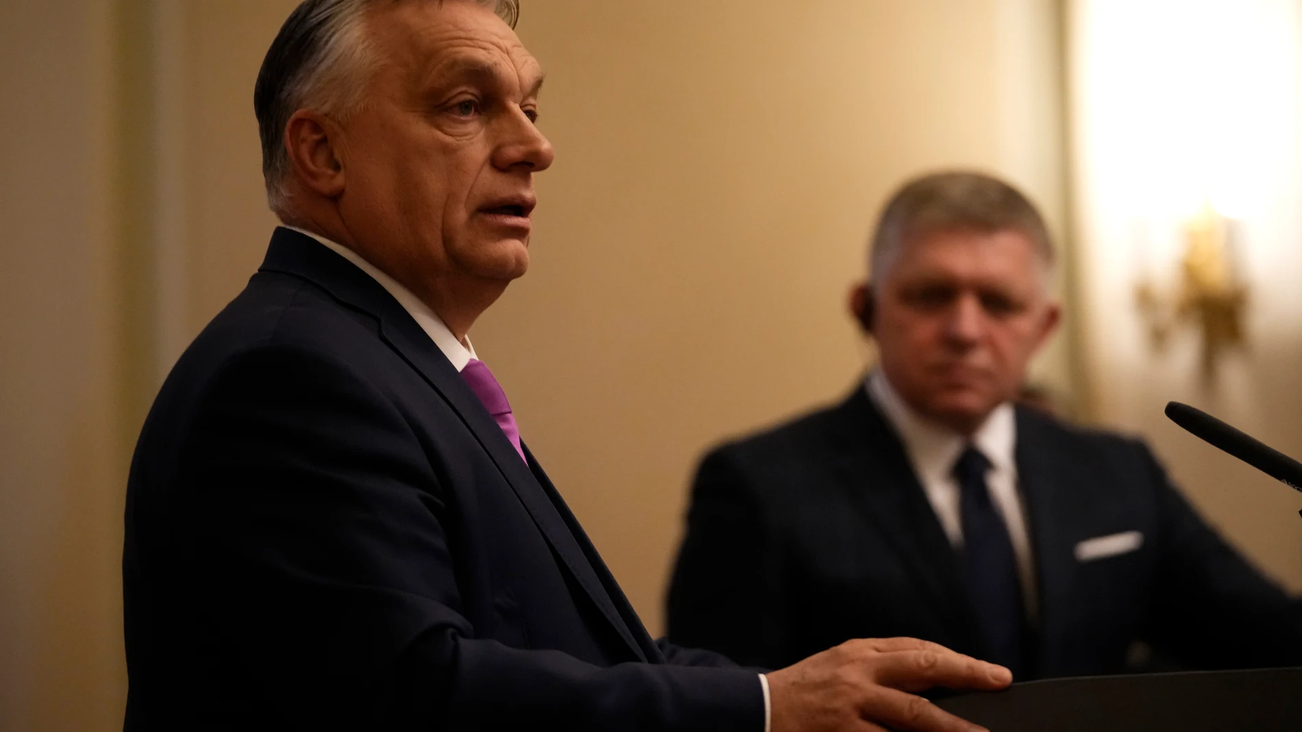Slovakia's Prime Minister Robert Fico, right, and his Hungarian counterpart Viktor Orban, left, address the media during a meeting in Bratislava, Slovakia, Tuesday, Jan. 21, 2025. (AP Photo/Petr David Josek)