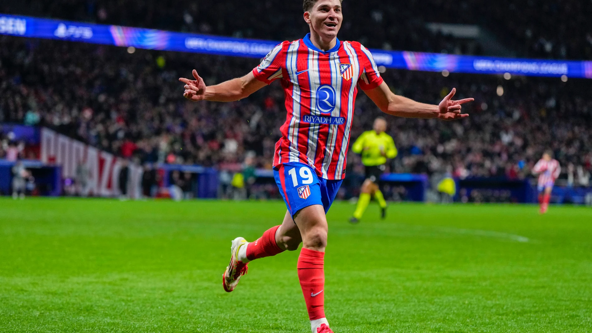 Atletico Madrid's Julian Alvarez celebrates after scoring his side's first goal against Bayer 04 Leverkusen during a Champions League opening phase soccer match at the Riyadh Air Metropolitano stadium in Madrid, Spain, Tuesday, Jan. 21, 2025. (AP Photo/Manu Fernandez)