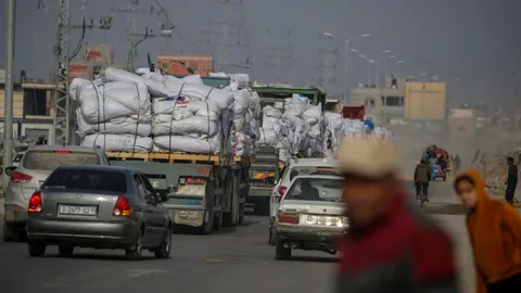 Egyptian humanitarian aid trucks drives on Al Din road