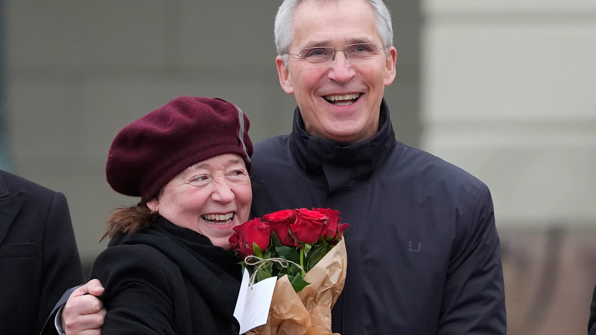 Jens Stoltenberg, Norway's new Minister of Finance, hugs his wife Ingrid Schulerud on the palace square, after Norway's Prime Minister Jonas Gahr Støre appointed a new government, in Oslo, Tuesday, Feb. 4, 2025. (Lise Åserud/NTB Scanpix via AP)