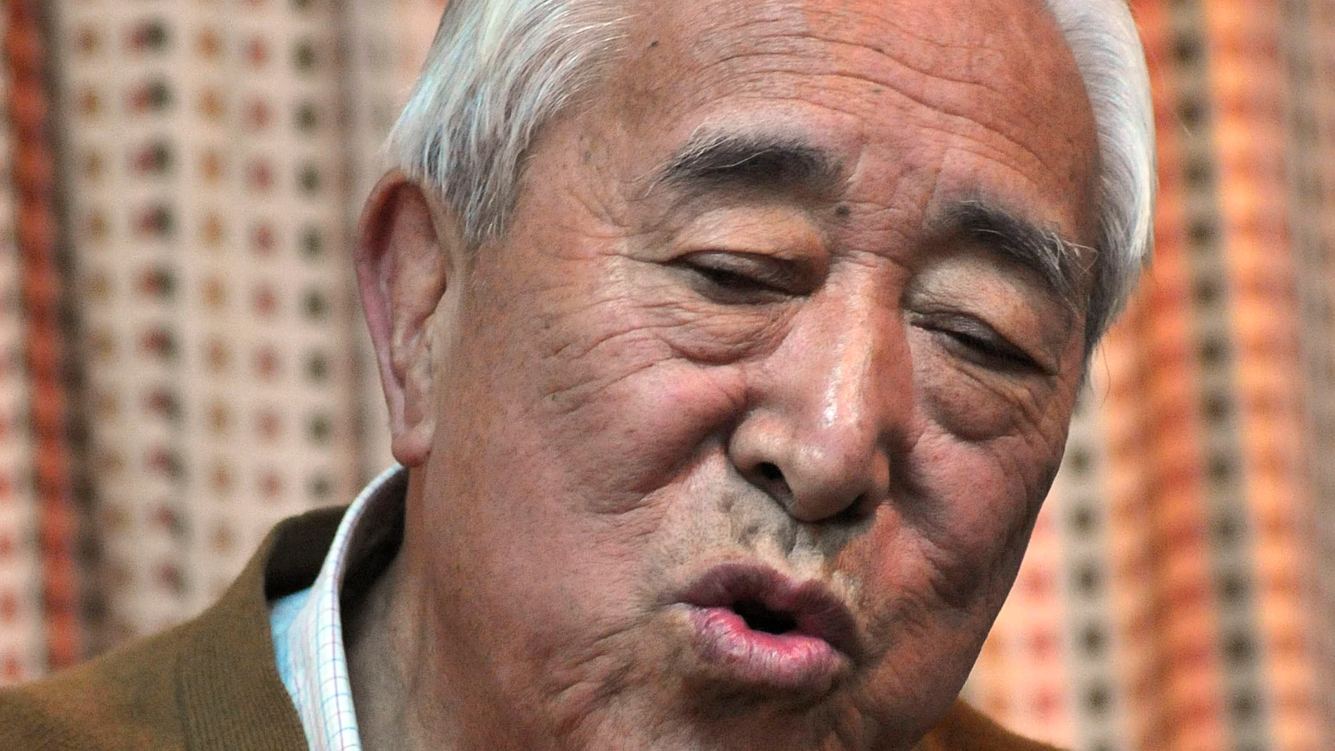 FILE - Gyalo Thondup, elder brother of the Dalai Lama, speaks to media in Dharamshala, India, Nov. 19, 2008. (AP Photo/Ashwini Bhatia, File)