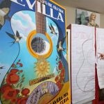 El alcalde, junto a uno de los artistas del Taller de Daroal en el momento de presentar el cartel de las Fiestas de Primavera de Sevilla.