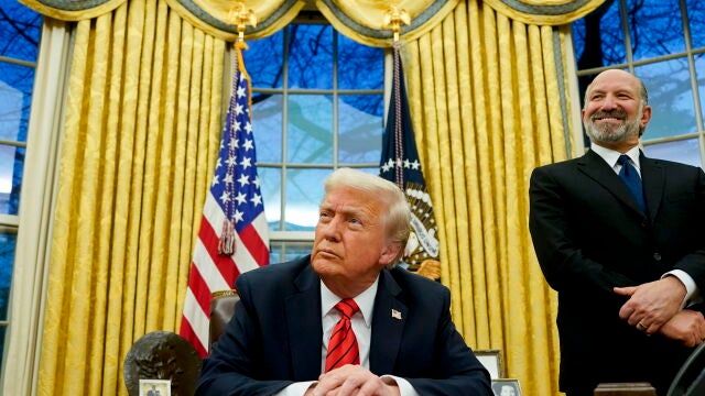 US President Trump signs executive order in Oval Office
