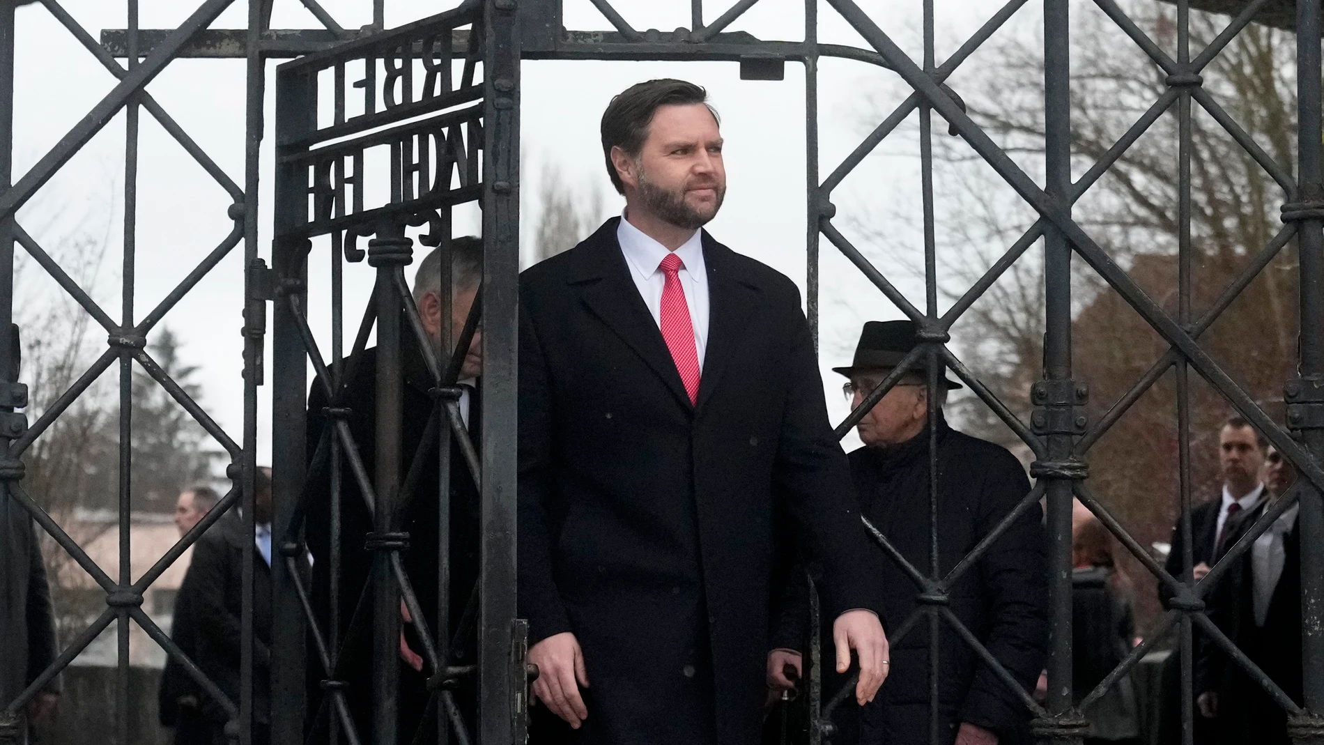 U.S. Vice President JD Vance enters the Dachau Concentration Camp Memorial Site outside Munich, Germany, Thursday, Feb. 13, 2025. (AP Photo/Matthias Schrader)
