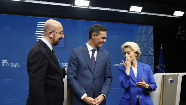 European Council President Charles Michel, Spain's Prime Minister Pedro Sanchez and European Commission President Ursula von der Leyen pose at a media conference at the conclusion of a European Union summit in Brussels