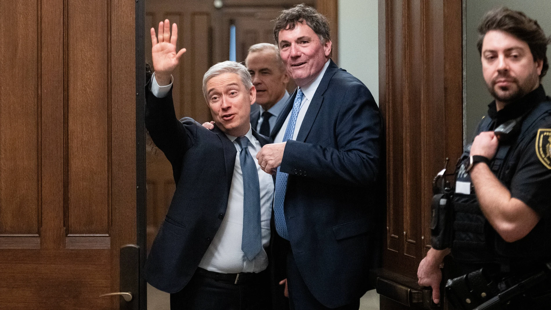 OTTAWA (Canada), 10/03/2025.- Minister of Innovation, Science and Industry François-Philippe Champagne, (L) and Minister of Intergovernmental Affairs and Minister of Finance, Dominic LeBlanc, speak to reporters following a Liberal Party caucus meeting in the House of Commons in Ottawa, Canada, 10 March 2025. EFE/EPA/SPENCER COLBY