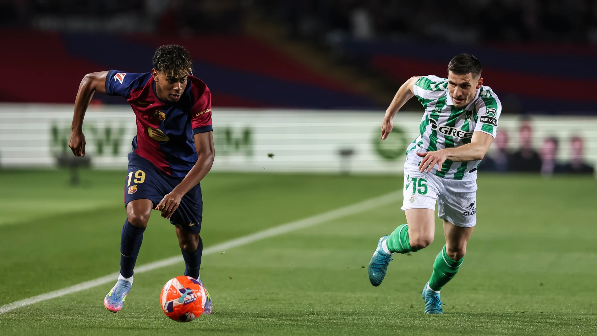 Lamine Yamal of FC Barcelona and Romain Perraud of Real Betis in action during the Spanish league, La Liga EA Sports, football match played between FC Barcelona and Real Betis at Estadi Olimpic Lluis Companys on April 05, 2025 in Barcelona, Spain. AFP7 05/04/2025 ONLY FOR USE IN SPAIN