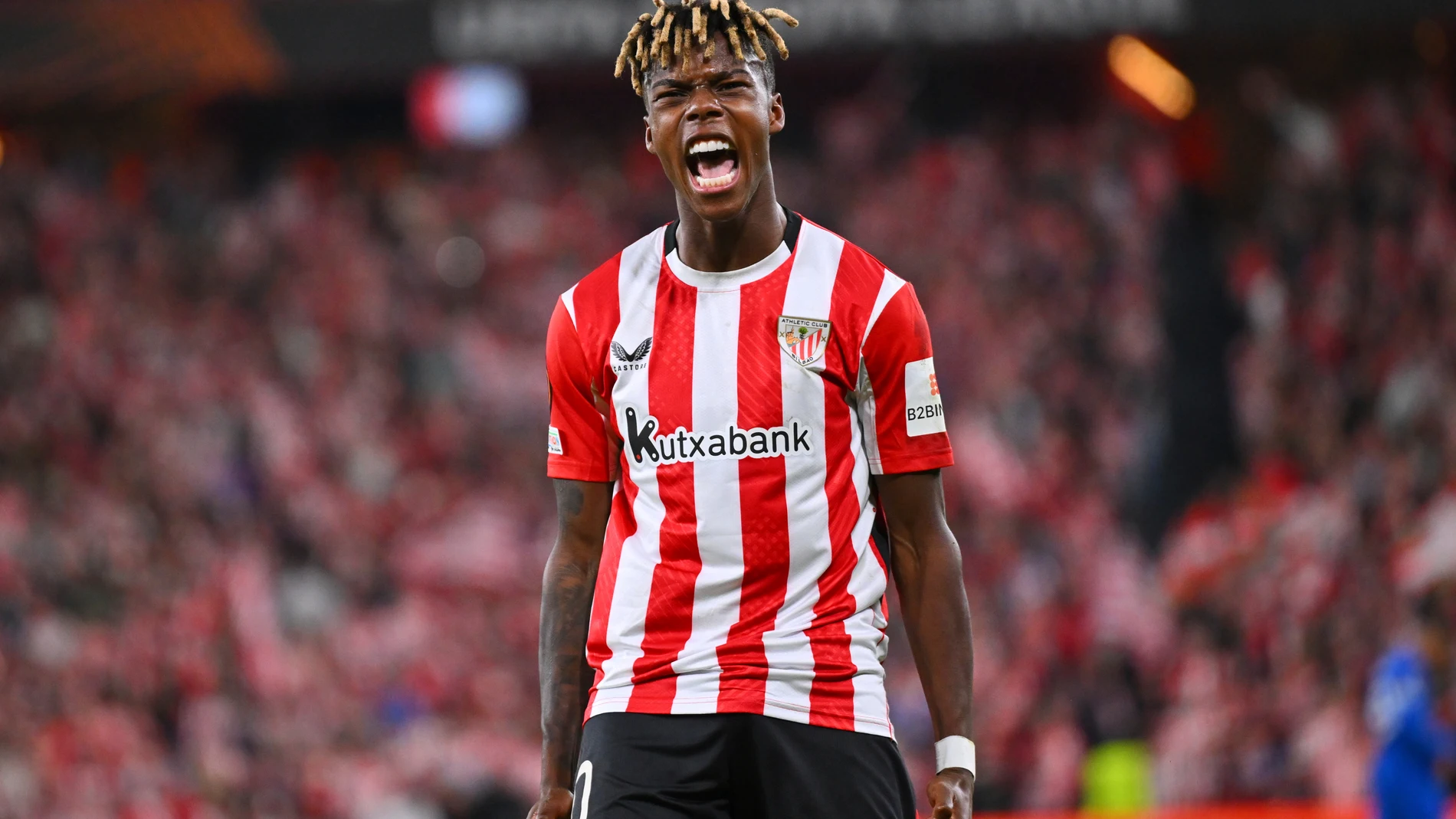 Athletic Bilbao's Nico Williams celebrates after scoring his side's second goal during the Europa League quarter final second leg soccer match between Athletic Bilbao and Glasgow Rangers in Bilbao, Spain, Thursday, April 17, 2025. (AP Photo/Miguel Oses)