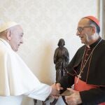 A handout picture provided by the Vatican Media shows Pope Francis giving audience to the President of the Spanish Episcopal Conference Cardinal Juan Jose Omella, Vatican City, 07 April 2022.