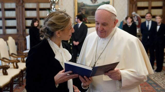 A handout picture provided by the Vatican Media shows Pope Francis meeting with Spanish Minister of Labor and Social Economy Yolanda Diaz Perez (L) in Vatican, 11 December 2021