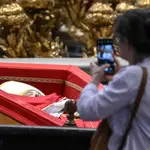 Pope Francis' body lies in state inside St. Peter's Basilica ahead of funeral