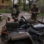 Ukrainian servicemen hold positions in the Donetsk region