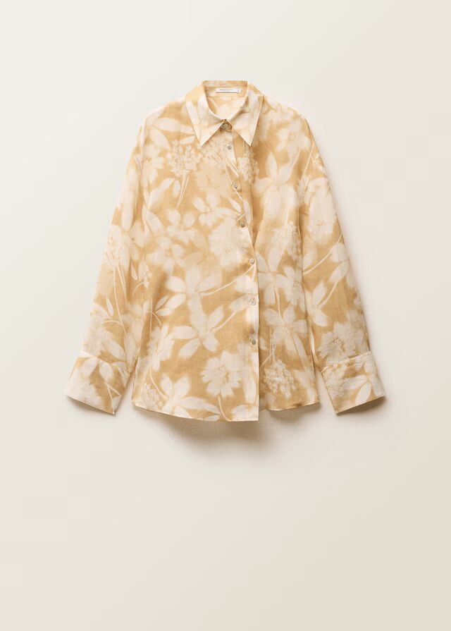 Camisa floral cierre multiposición.