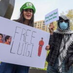 Protesters gather outside court house during hearing for Luigi Mangione