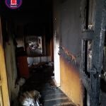 Estado de la vivienda incendiada en Murcia