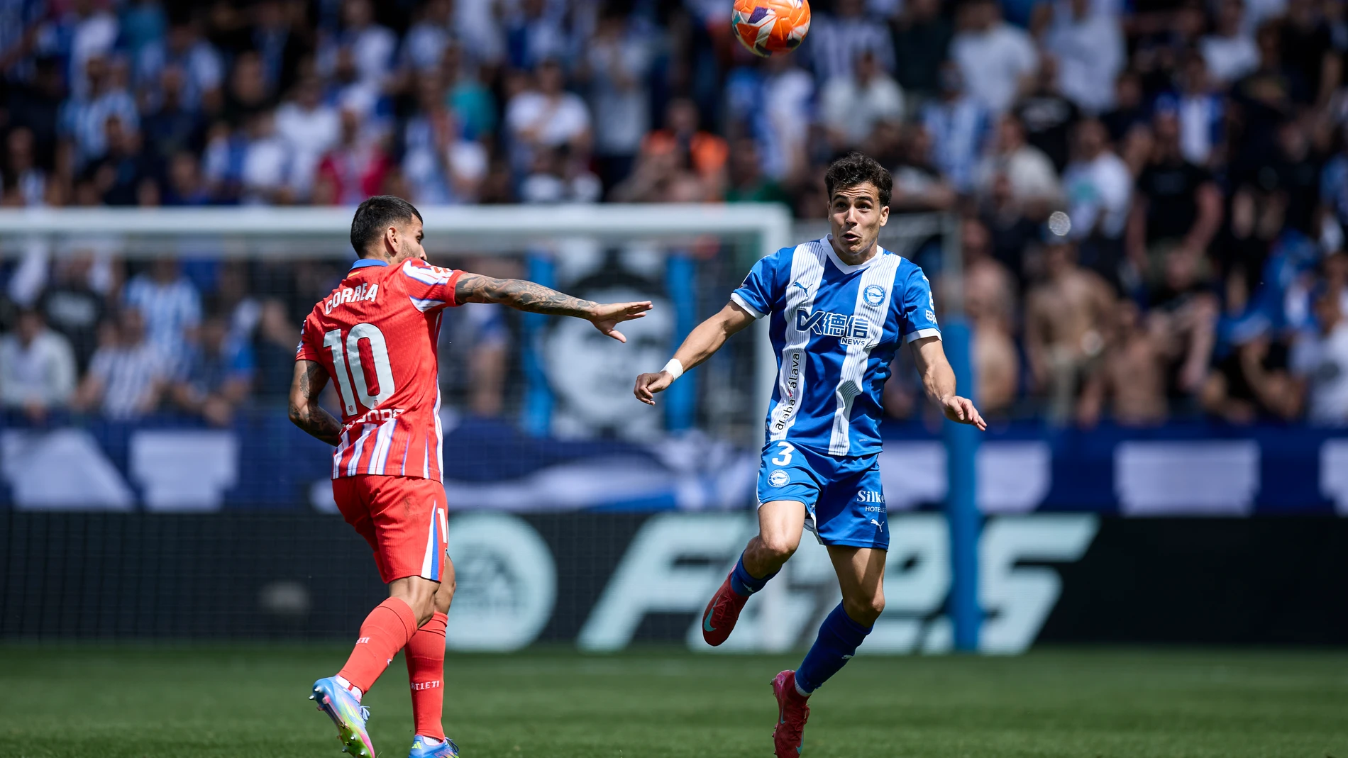 Angel Martin Correa of Deportivo Alaves competes for the ball with Manu Sanchez of Deportivo Alaves during the LaLiga EA Sports match between Deportivo Alaves and Atletico de Madrid at Mendizorrotza on May 3, 2025, in Vitoria, Spain. AFP7 03/05/2025 ONLY FOR USE IN SPAIN
