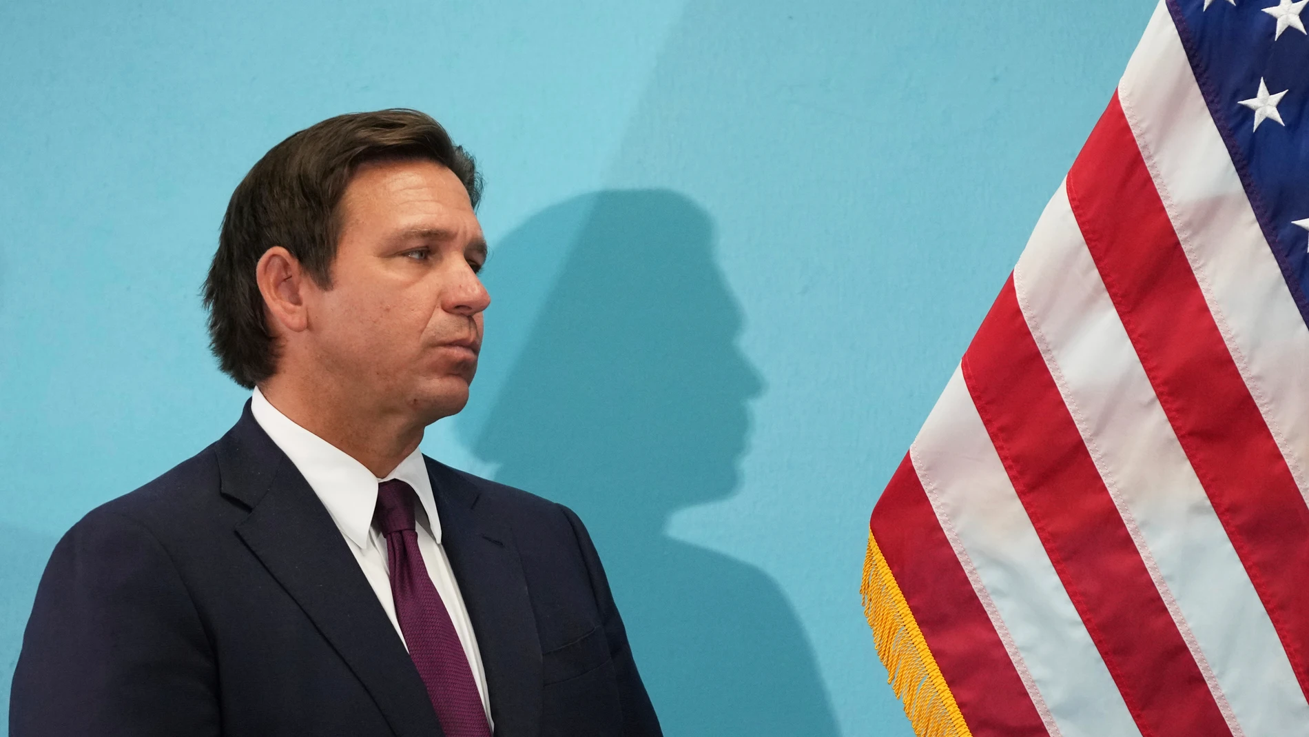Florida Gov. Ron DeSantis listens during a public event where he announced he would sign a bill banning the use of fluoride in public water systems, Tuesday, May 6, 2025, in Miami. (AP Photo/Lynne Sladky)