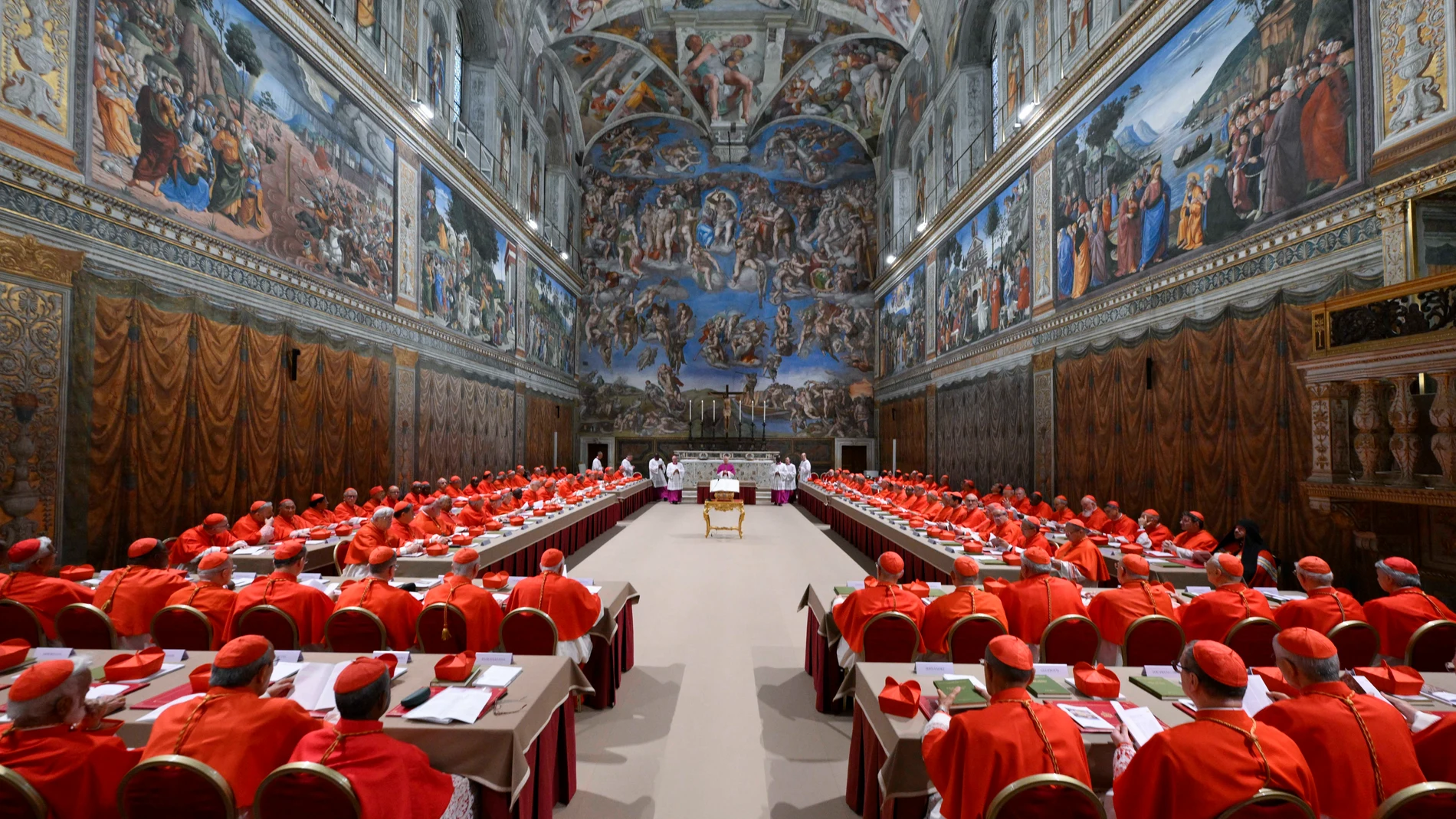 Cardinals attend the first day of the conclave to elect the successor of late Pope Francis inside the Sistine Chapel at the Vatican, Wednesday, May 7, 2025. (Vatican Media via AP)