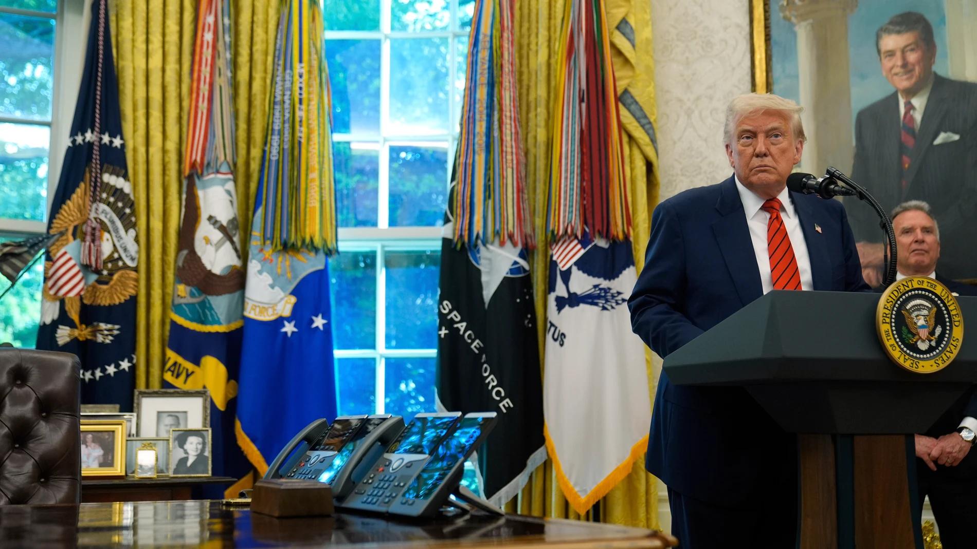 President Donald Trump speaks before Steve Witkoff is sworn as special envoy during a ceremony in the Oval Office of the White House, Tuesday, May 6, 2025, in Washington. (AP Photo/Mark Schiefelbein)