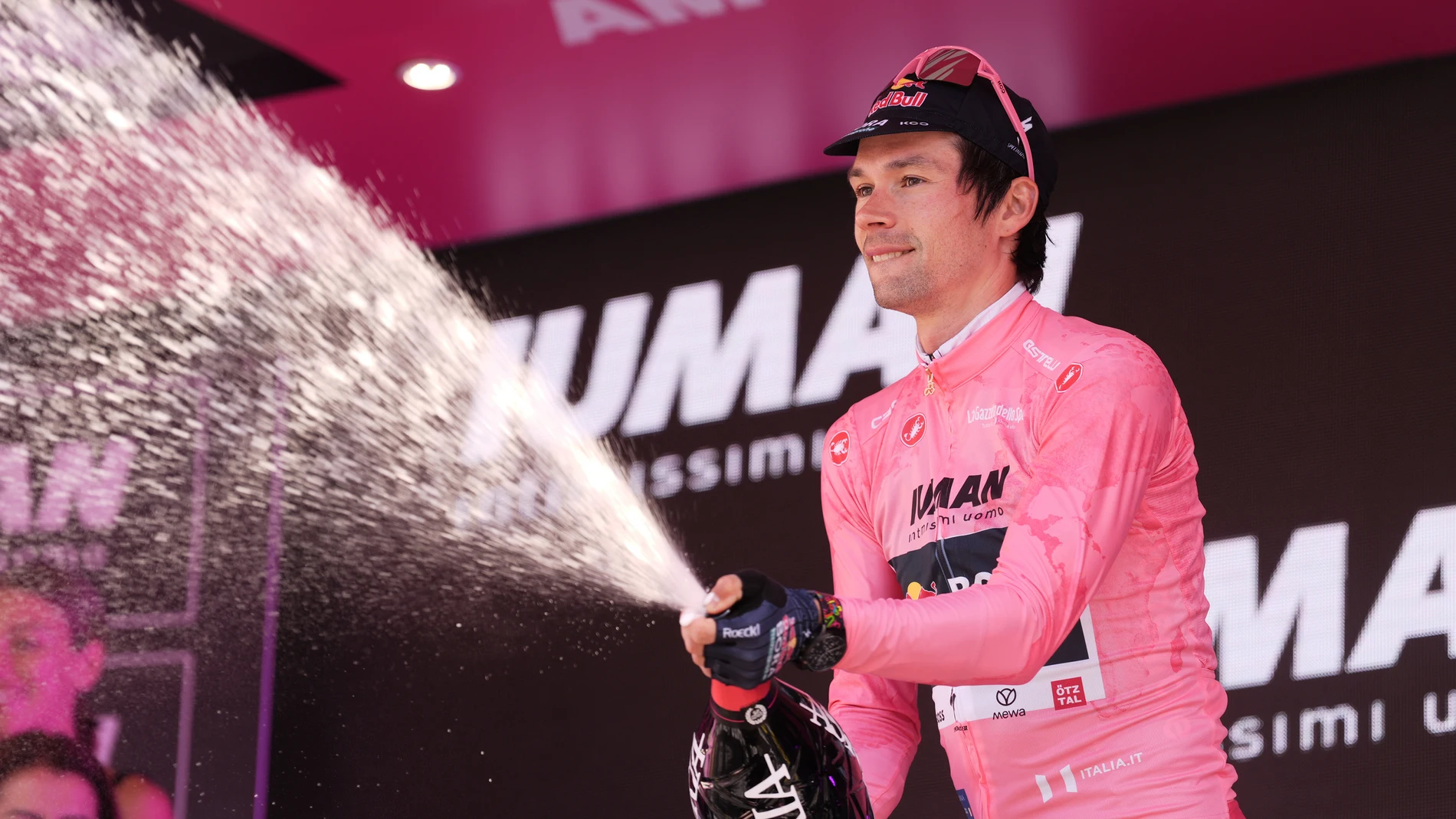 Slovenia's Primoz Roglic wears the pink jersey of the overall leader at the end of the time trial stage 2 of the Giro d'Italia cycling race, in Tirana, Albania, Saturday, May 10, 2025. (Massimo Paolone/LaPresse via AP)