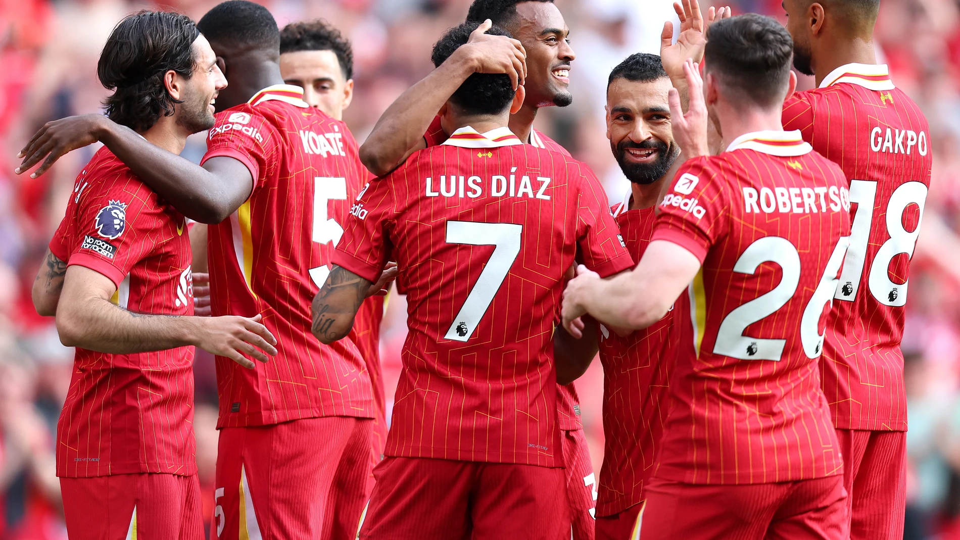 LIVERPOOL (United Kingdom), 11/05/2025.- Luis Diaz of Liverpool celebrates with teammates after his team's second goal during the English Premier League soccer match between Liverpool FC and Arsenal FC, in Liverpool, Britain, 11 May 2025. (Reino Unido) EFE/EPA/ASH ALLEN EDITORIAL USE ONLY. No use with unauthorized audio, video, data, fixture lists, club/league logos, 'live' services or NFTs. Online in-match use limited to 120 images, no video emulation. No use in betting, games or single club...