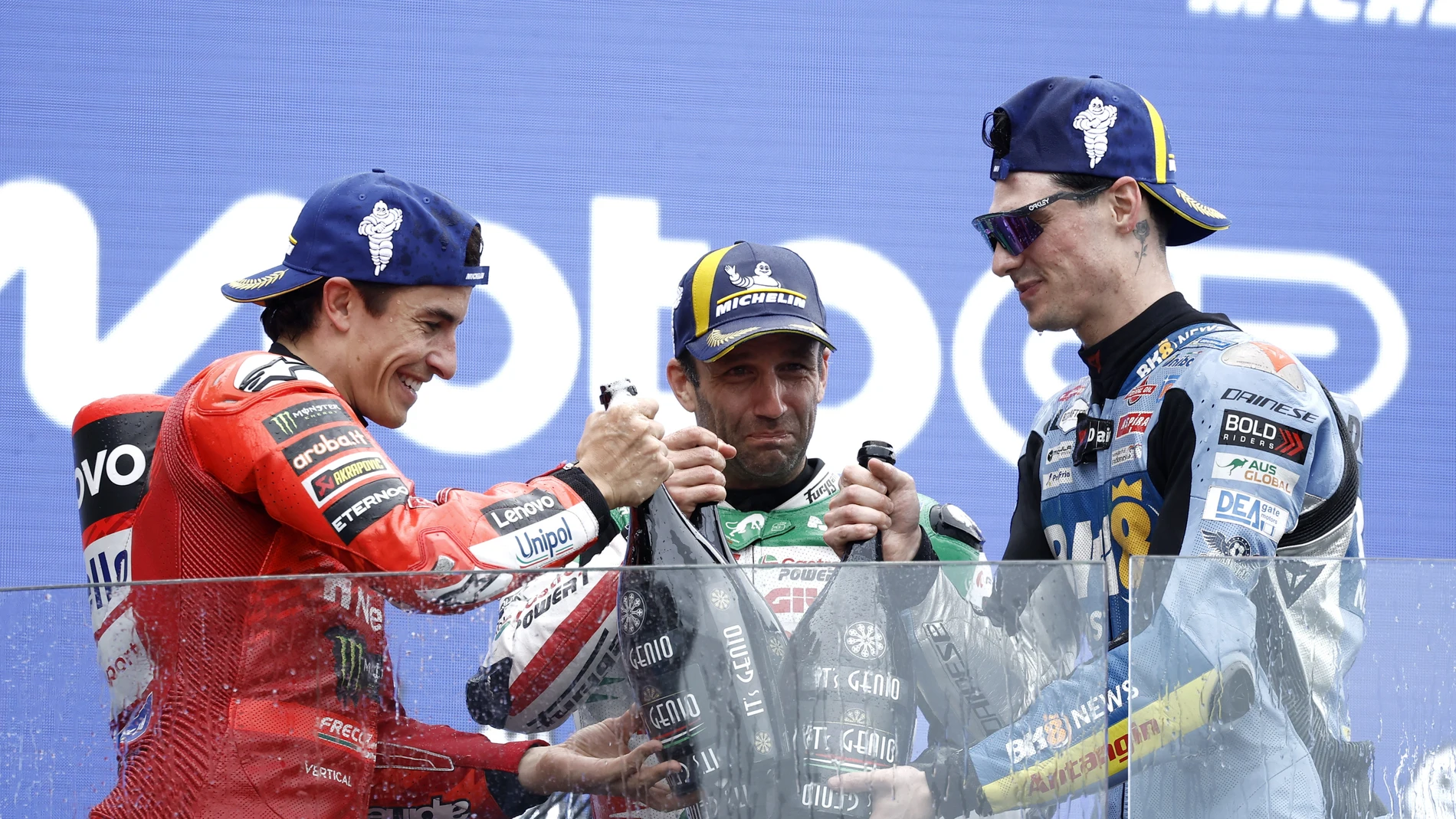 LE MANS (France), 11/05/2025.- (L-R) Second placed Spanish MotoGP rider Marc Marquez of Ducati Lenovo Team, French MotoGP rider Johann Zarco of LCR Honda Team and third placed Spanish rider Fermin Aldeguer of BK8 Gresini Racing team celebrate on the podium after the Moto GP race at the French Motorcycling Grand Prix in Le Mans, France, 11 May 2025. (Motociclismo, Francia) EFE/EPA/YOAN VALAT