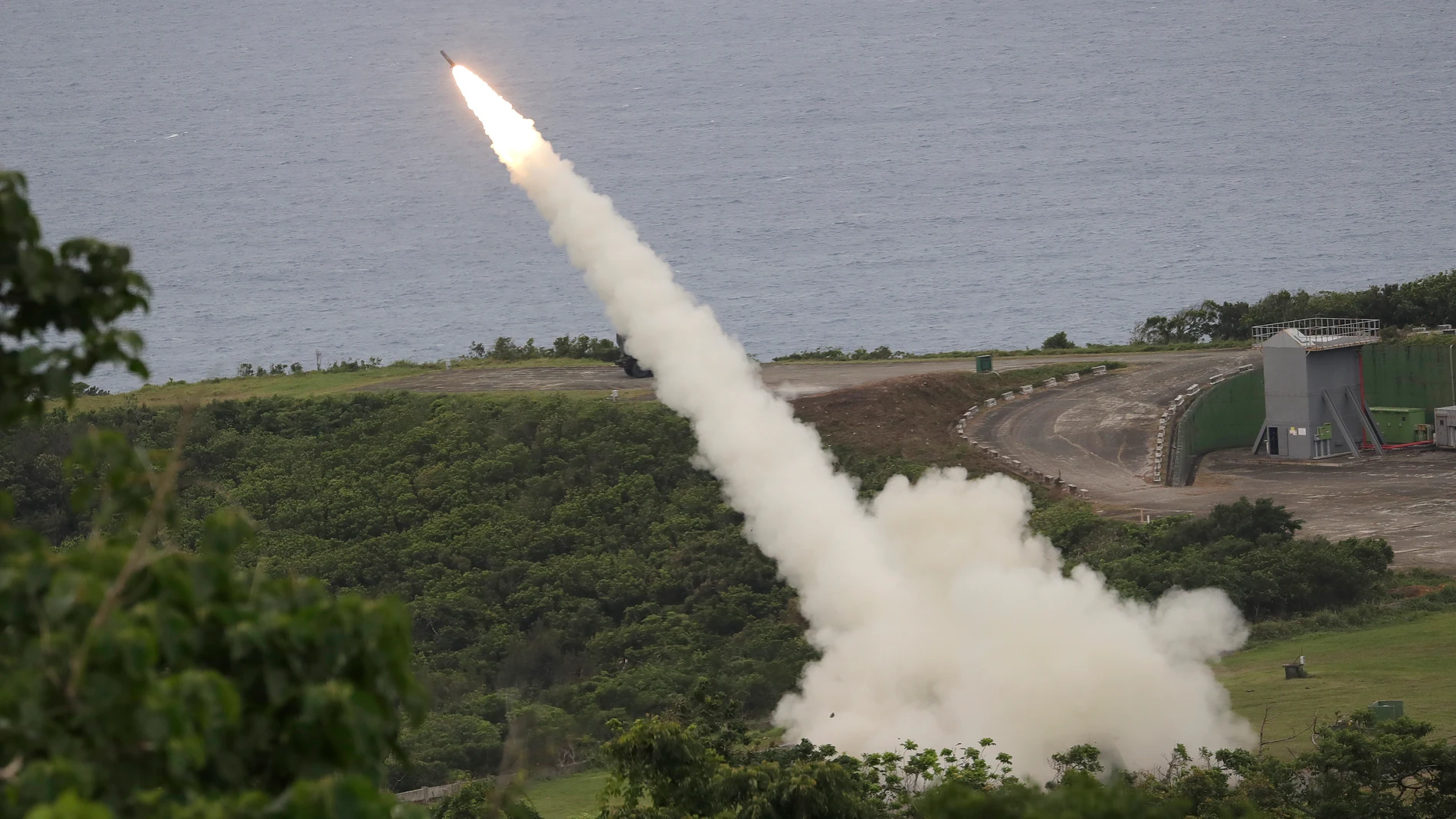 A rocket practice round is launched from a M142 High Mobility Artillery Rocket System (HIMARS) during a testing drill in Pingtung County, Southern Taiwan, Monday, May 12, 2025. (AP Photo/Chiang Ying-ying)