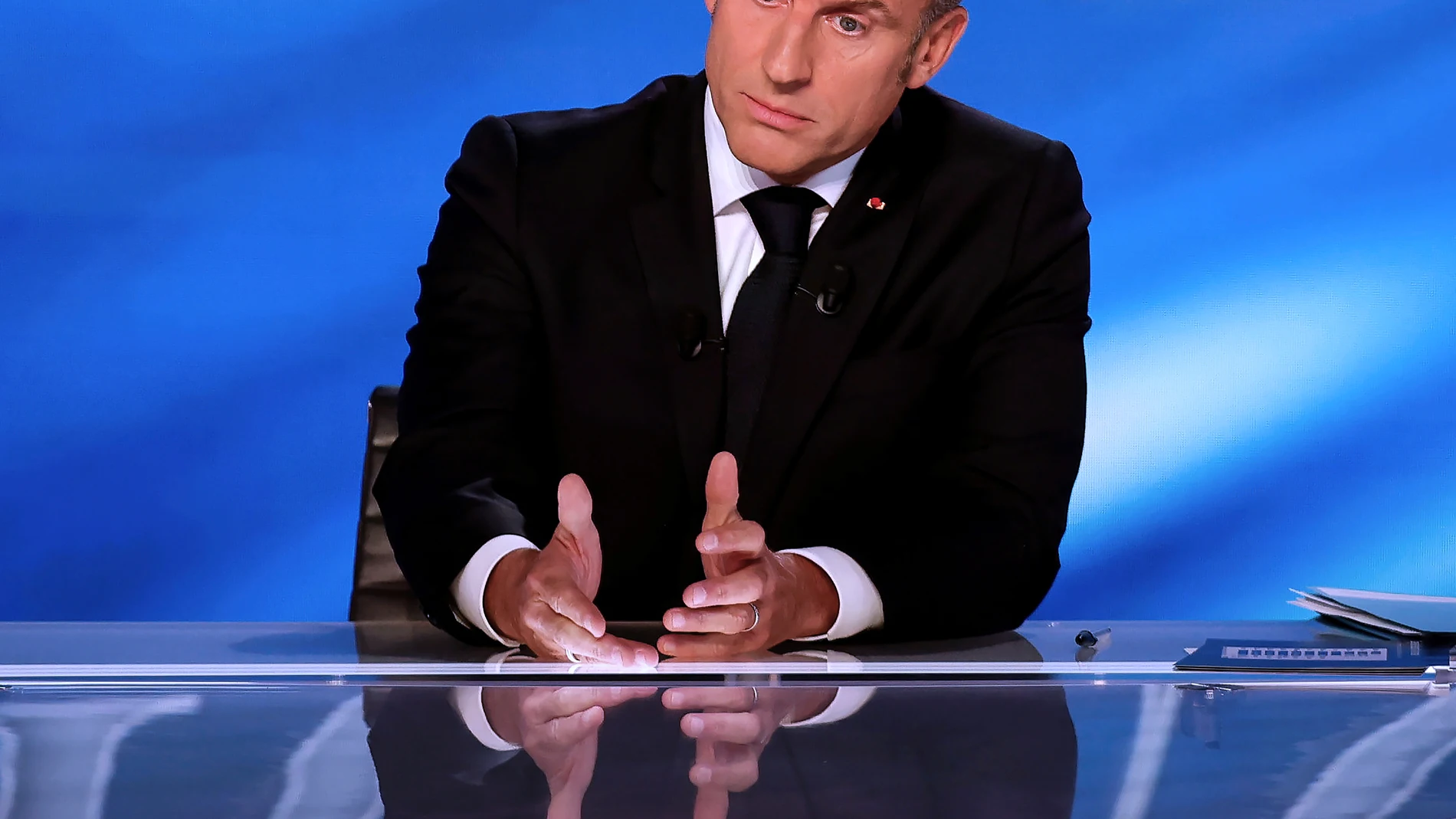 France's President Emmanuel Macron takes part in a special program of the French channel TF1 in Saint-Denis, north of Paris, Tuesday, May 13, 2025. (Ludovic Marin/Pool Photo via AP)