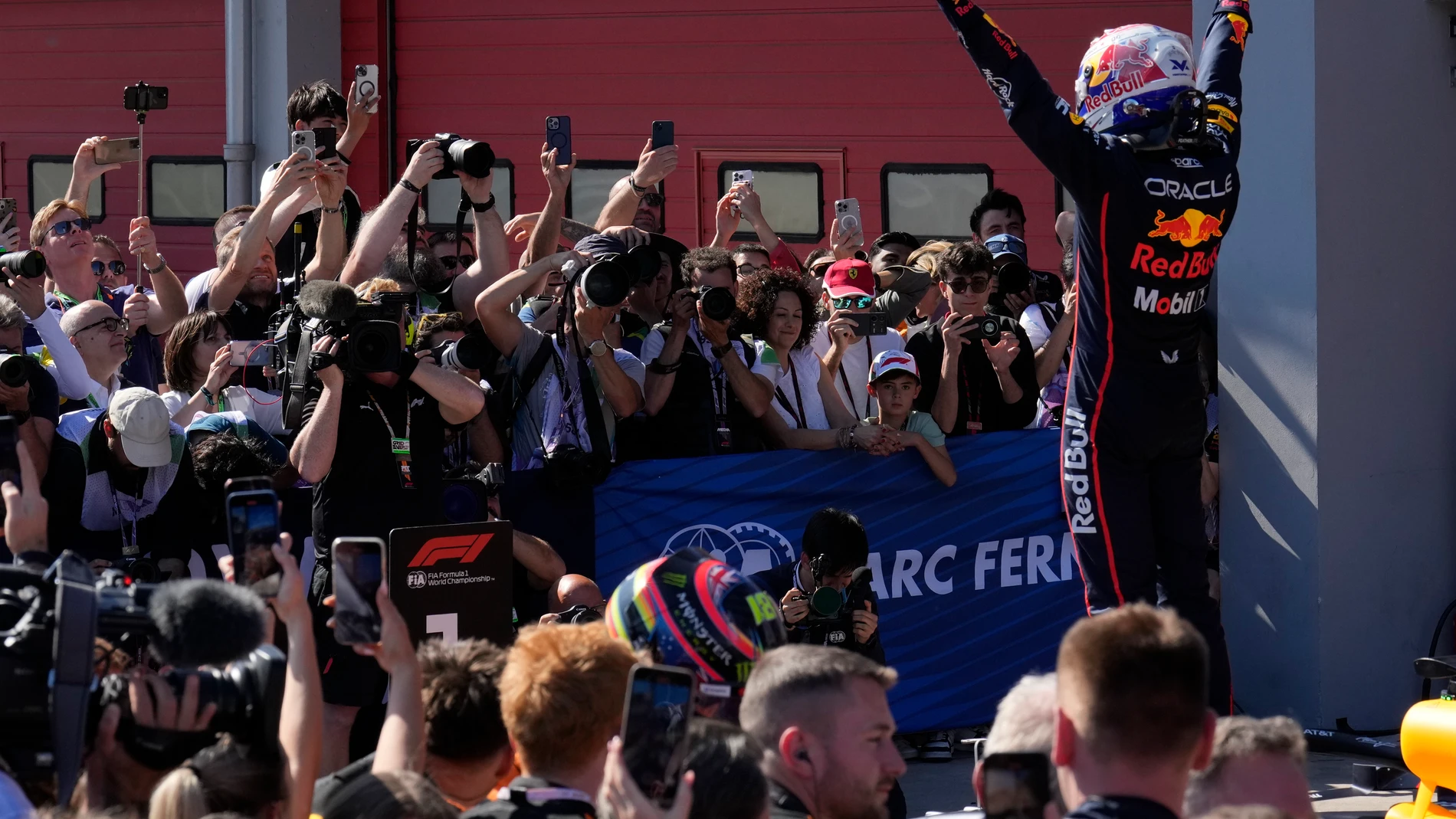 Red Bull driver Max Verstappen of the Netherlands celebrates after winning the Italian Emilia Romagna Formula One Grand Prix, at the Enzo and Dino Ferrari racetrack in Imola, Italy, Sunday, May 18, 2025. (AP Photo/Luca Bruno)