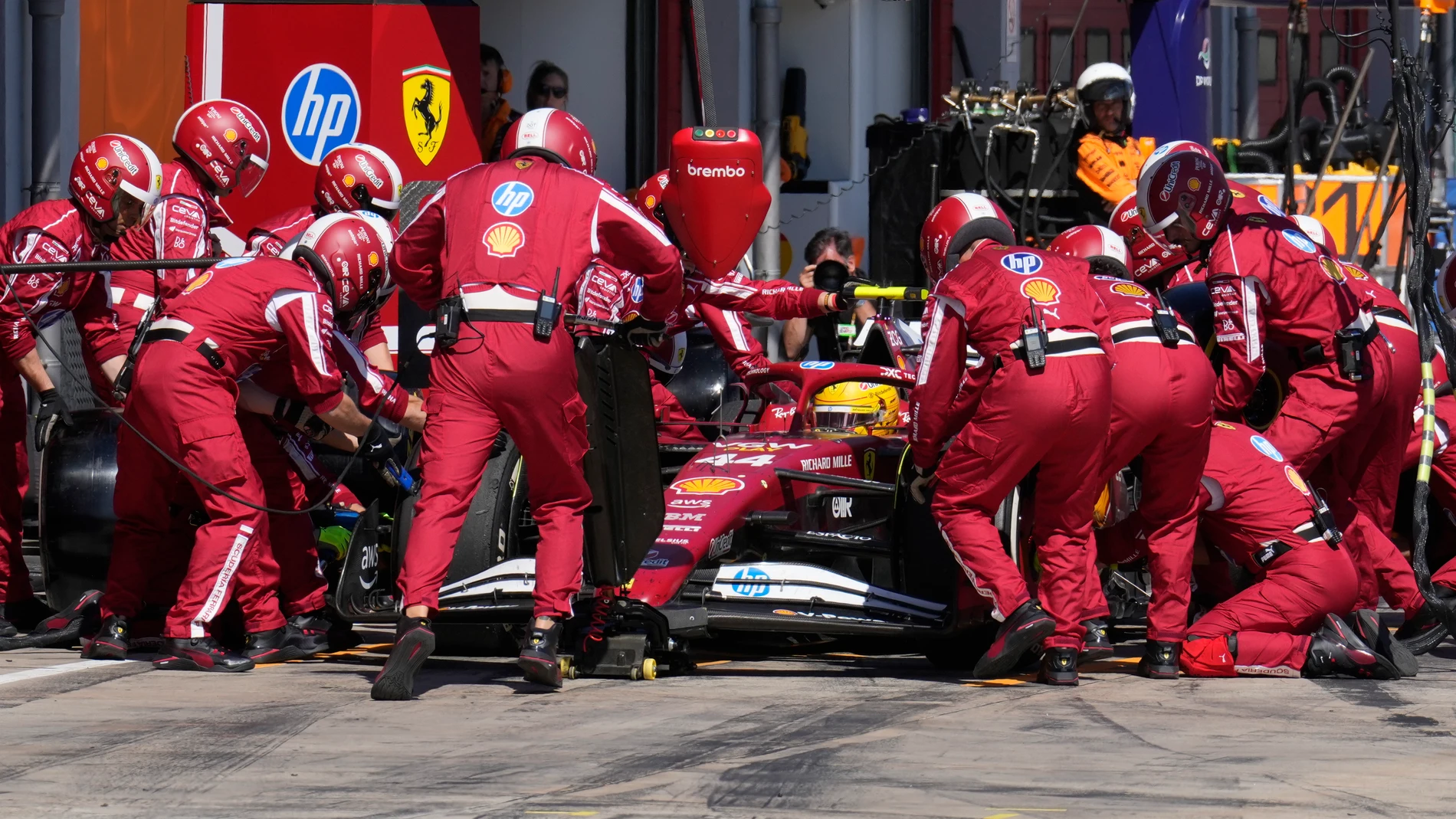 Ferrari driver Lewis Hamilton of Britain gets a pit service during the Italian Emilia Romagna Formula One Grand Prix, at the Enzo and Dino Ferrari racetrack in Imola, Italy, Sunday, May 18, 2025. (AP Photo/Luca Bruno, Pool)