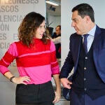 Isabel Díaz Ayuso y Juanma Moreno en un acto del partido en 2024 
