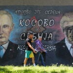 A mural depicting Trump and Putin in Belgrade ahead of their phone call