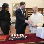  A handout picture provided by the Vatican Media shows US Vice President JD Vance and his wife Usha Vance with Pope Leo XIV during their meeting in the Vatican, May 19, 2025