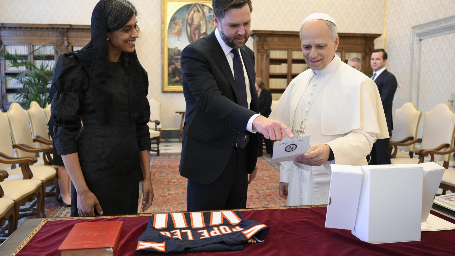 A handout picture provided by the Vatican Media shows US Vice President JD Vance and his wife Usha Vance with Pope Leo XIV during their meeting in the Vatican, May 19, 2025