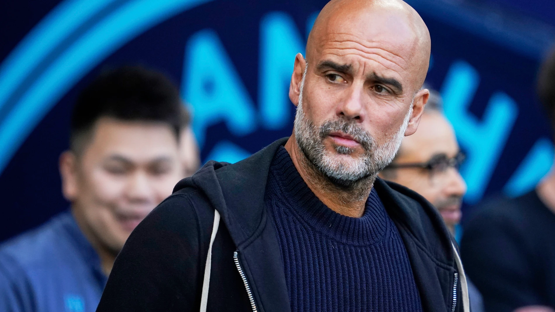 Manchester City's head coach Pep Guardiola waits for the start of the English Premier League soccer match between Manchester City and Bournemouth at the Etihad stadium in Manchester, England, Tuesday, May 20, 2025. (AP Photo/Dave Thompson)