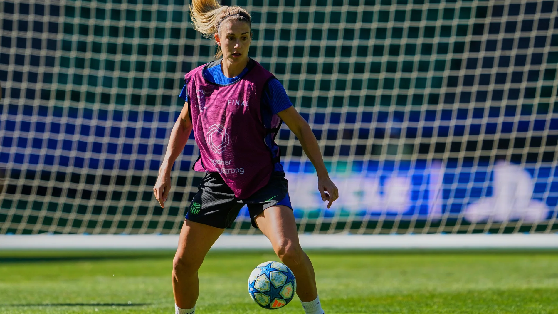 Barcelona's Alexia Putellas plays the ball during a training session, on the eve of the women's Champions League final soccer match between Arsenal and FC Barcelona, at the Jose Alvalade Stadium, in Lisbon, Friday, May 23, 2025. (AP Photo/Armando Franca)
