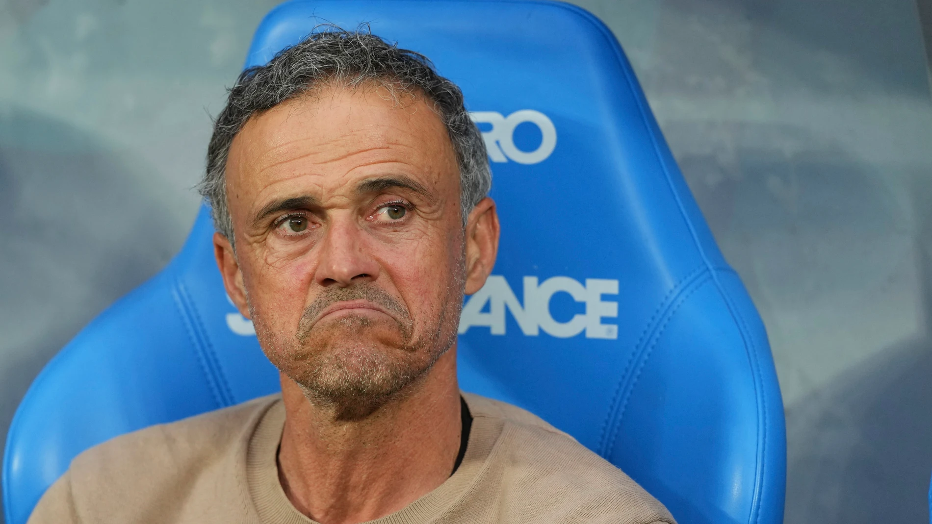 PSG's head coach Luis Enrique sits on the bench prior to the French Cup soccer final between Paris Saint-Germain and Reims at the Stade de France stadium in Saint-Denis, outside Paris, Saturday, May 24, 2025. (AP Photo/Aurelien Morissard)