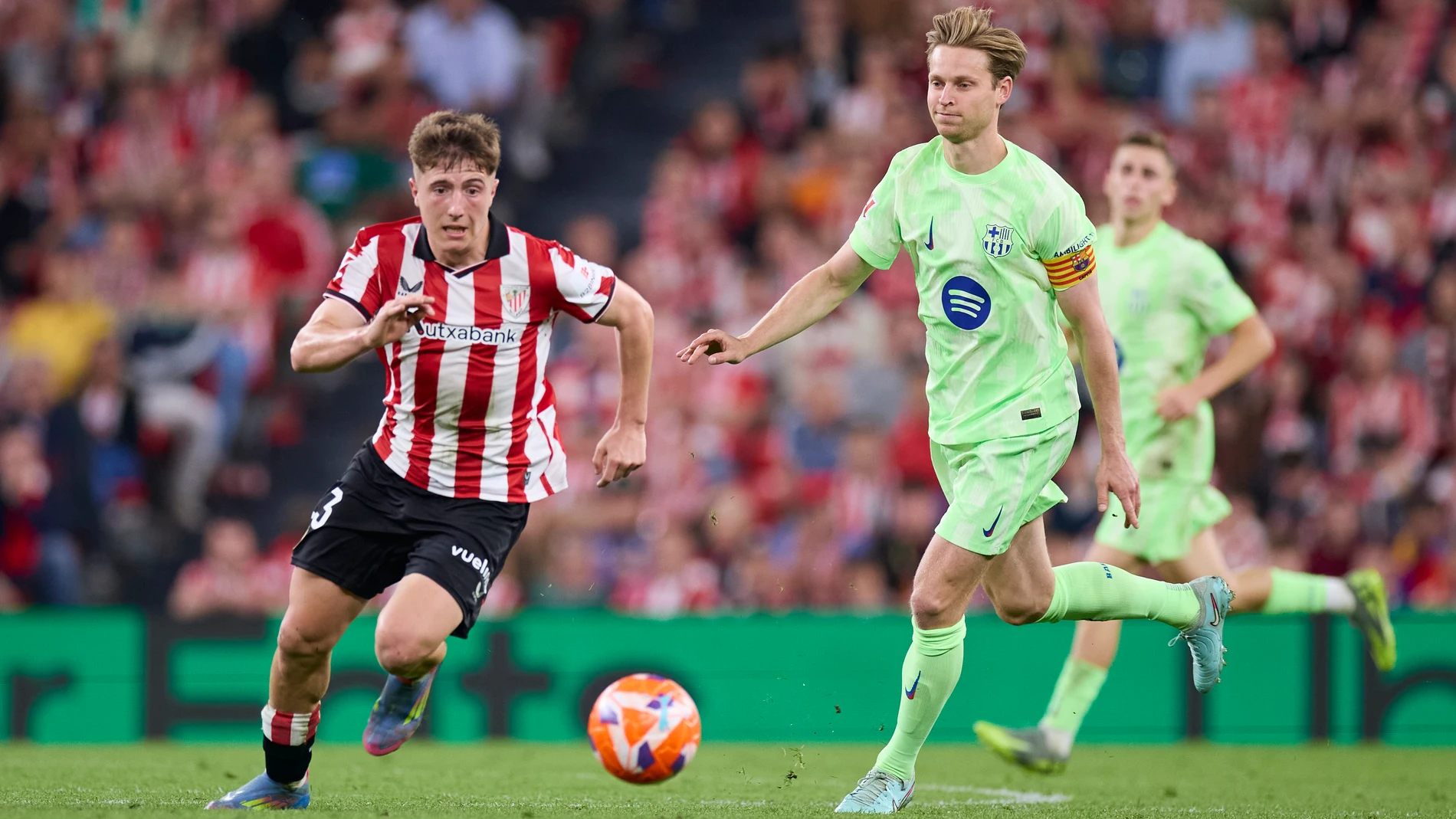 Mikel Jaureguizar of Athletic Club competes for the ball with Frenkie de Jong of FC Barcelona during the LaLiga EA Sports match between Athletic Club and FC Barcelona at San Mames on May 25, 2025, in Bilbao, Spain. AFP7 25/05/2025 ONLY FOR USE IN SPAIN