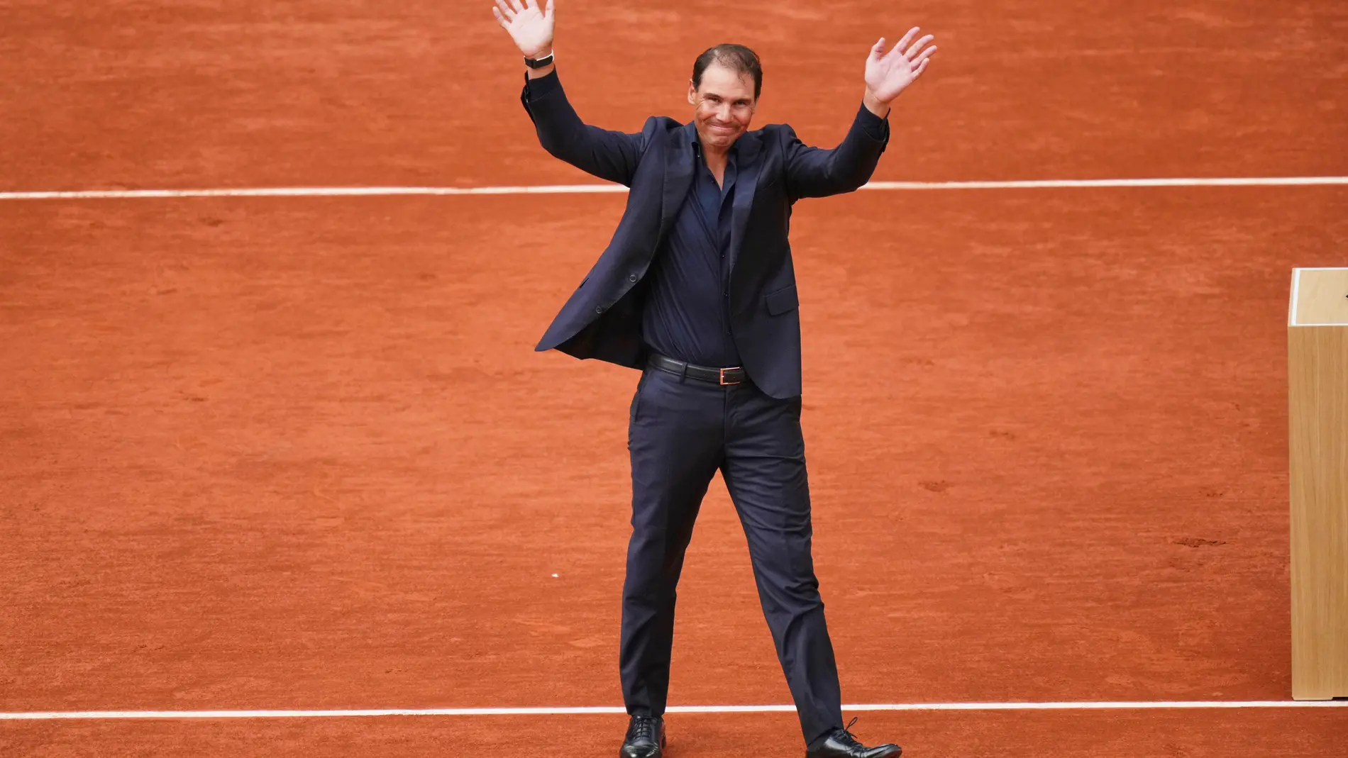 Rafa Nadal waves during a farewell ceremony at center court Philippe-Chatrier, at the Roland-Garros stadium, in Paris, Sunday May 25, 2025. (AP Photo/Thibault Camus)