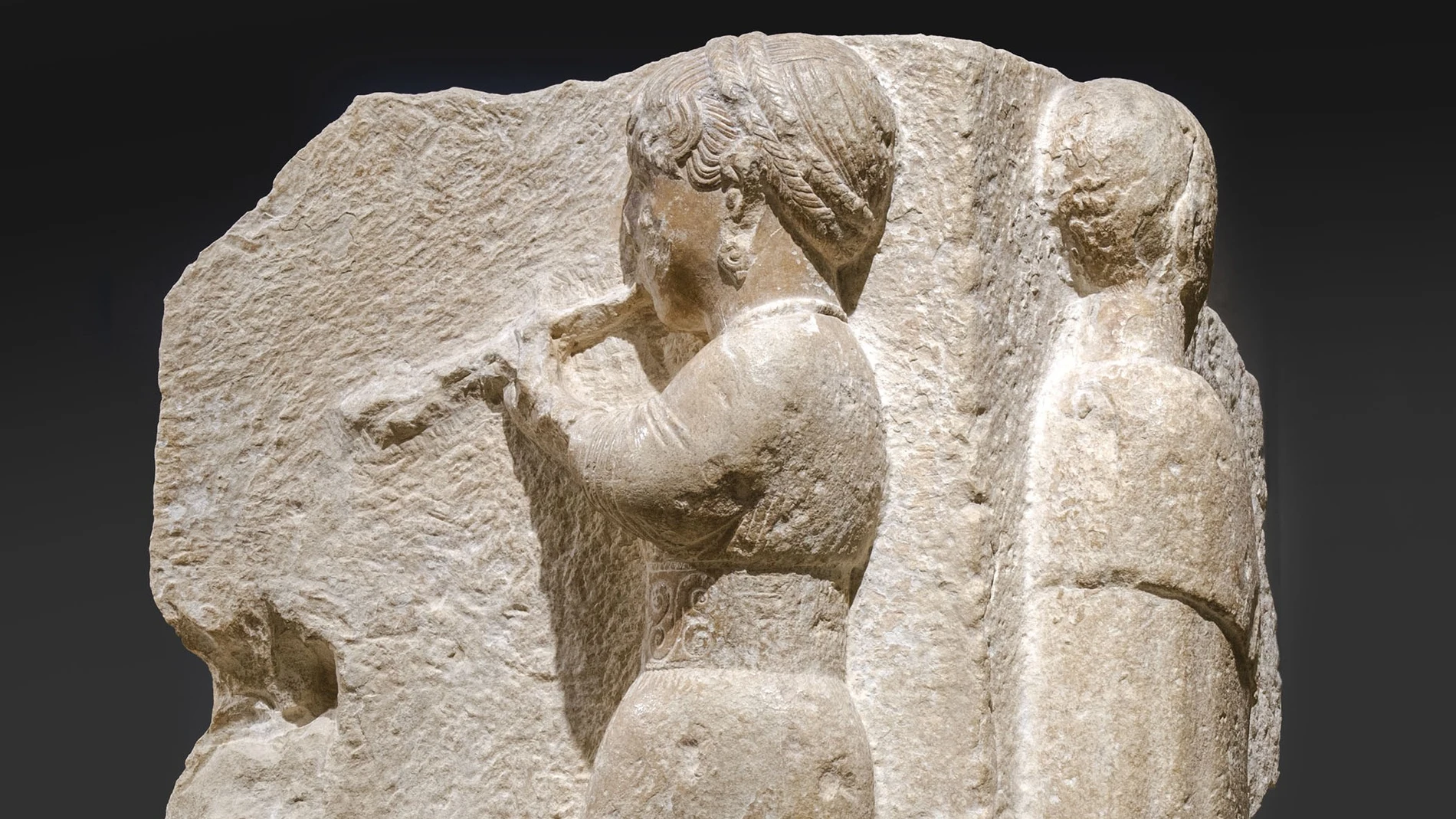 Una representación de Auletris de Osuna en el Museo Arqueológico Nacional