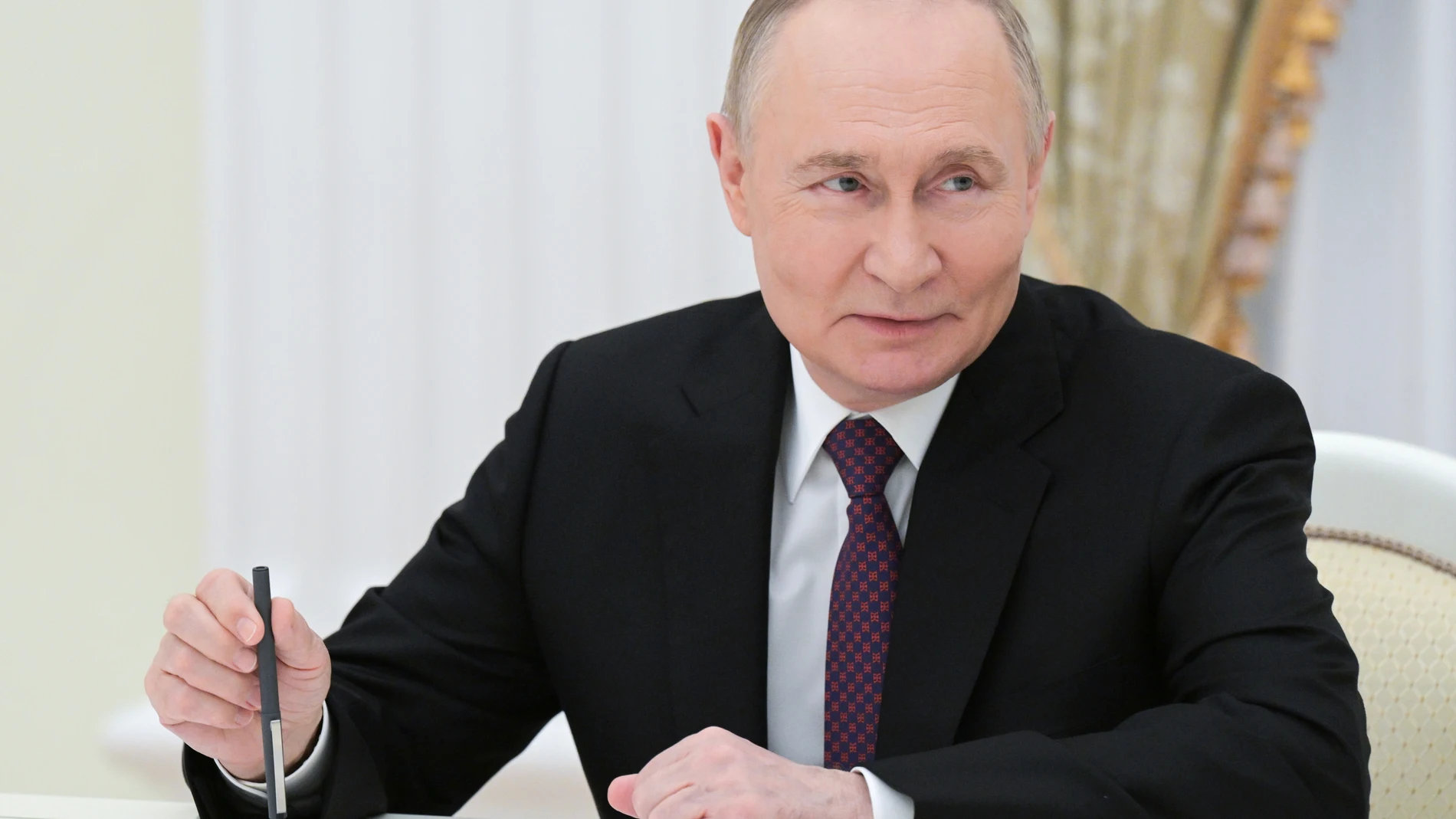 Russian President Vladimir Putin speaks with the Chairman of the National Assembly of Tajikistan, the Mayor of Dushanbe Rustam Emomali during their meeting at the Senate Palace at the Kremlin in Moscow, Russia, Wednesday, May 28, 2025. (Alexei Nikolsky, Sputnik, Kremlin Pool Photo via AP)