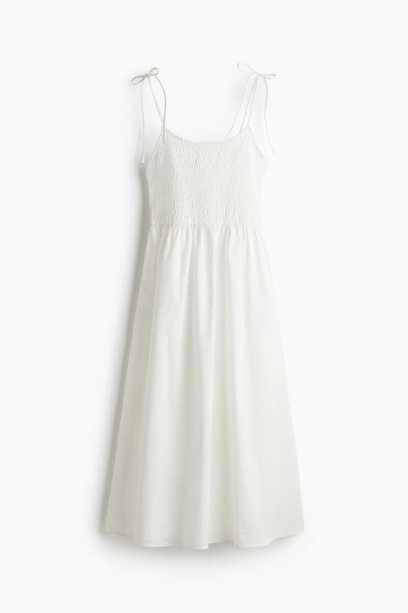 Vestido nido de abeja con tirantes de lazo.