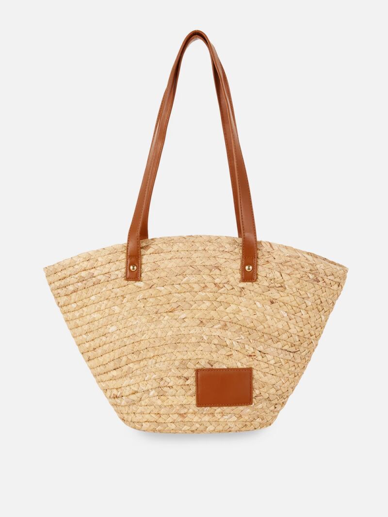 Bolso bombonera de paja.