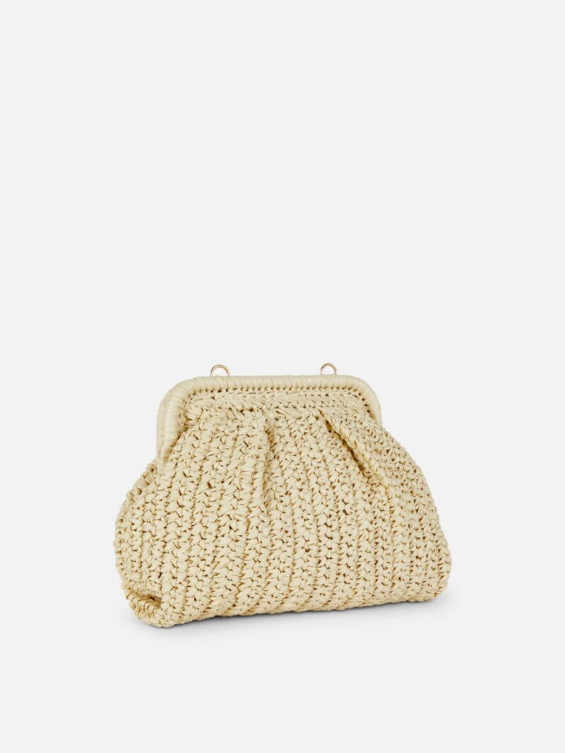 Bolso de mano de paja de Paula Echevarría.