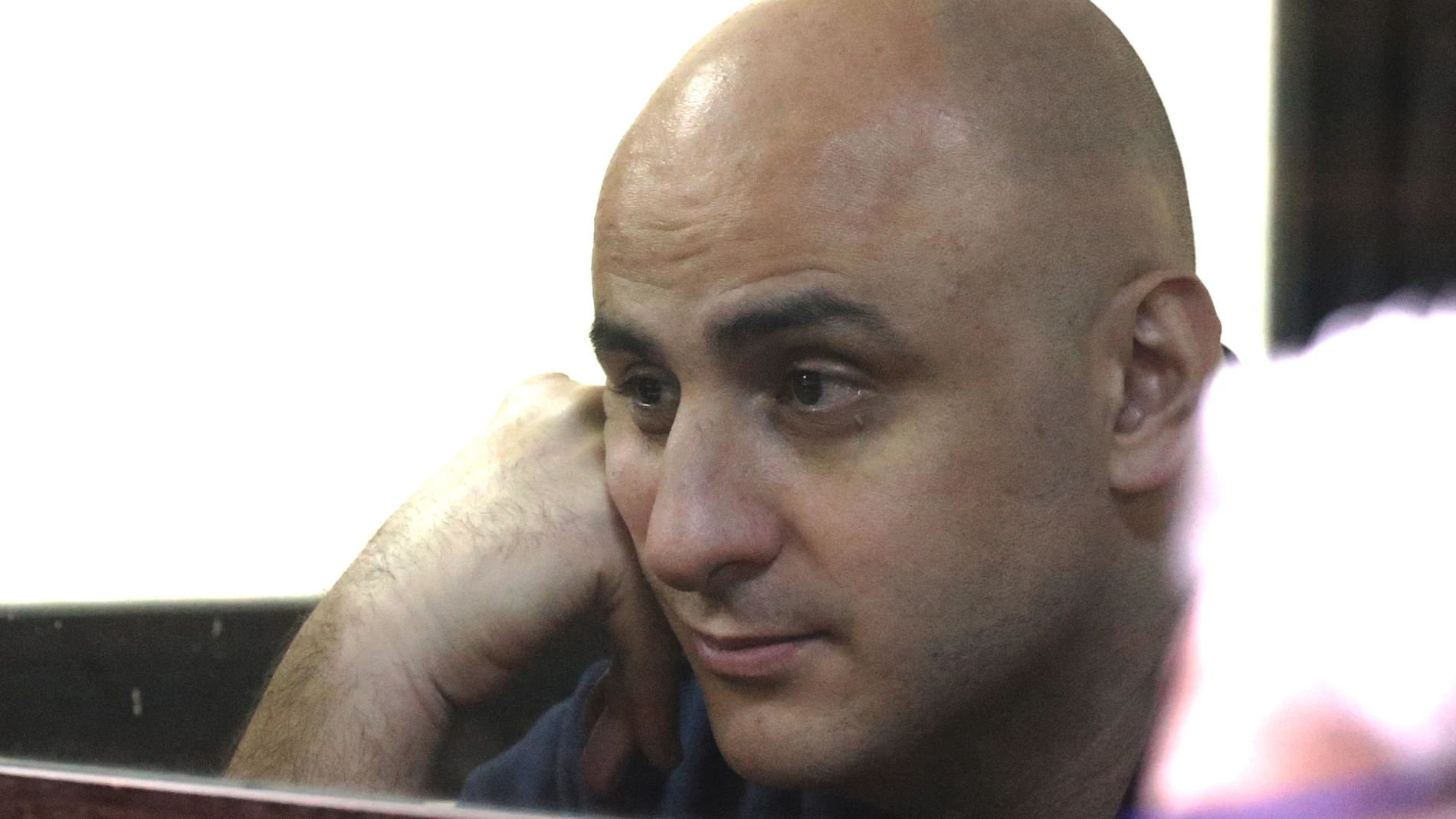 Nika Melia, one of the leaders of the Coalition for Change opposition group, charged with failing to appear before the Georgian parliament's temporary investigative commission, attends a court hearing in Tbilisi, Georgia on Friday, May 30, 2025. (Irakli Gedenidze/Pool Photo via AP)