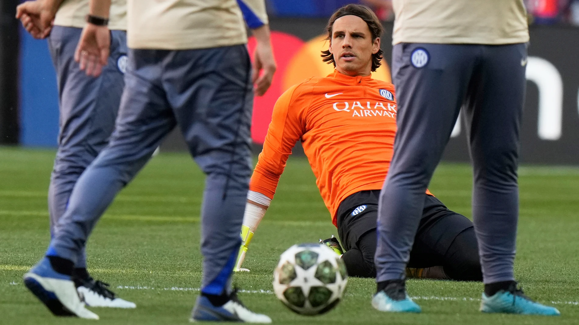 Inter Milan's goalkeeper Yann Sommer sits on the pitch during a training session ahead of the Champions League final soccer match between Paris Saint-Germain and Inter Milan in Munich, Germany, Friday, May 30, 2025. (AP Photo/Luca Bruno)