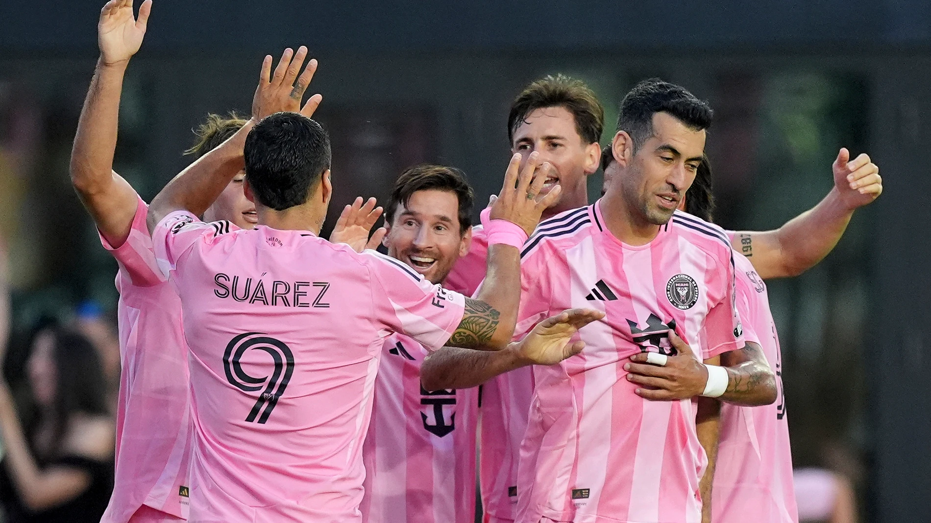 Teammates celebrate with Inter Miami forward Lionel Messi, center, after he scored the side's second goal against Columbus Crew during the first half of an MLS soccer match, Saturday, May 31, 2025, in Fort Lauderdale, Fla. (AP Photo/Rebecca Blackwell)